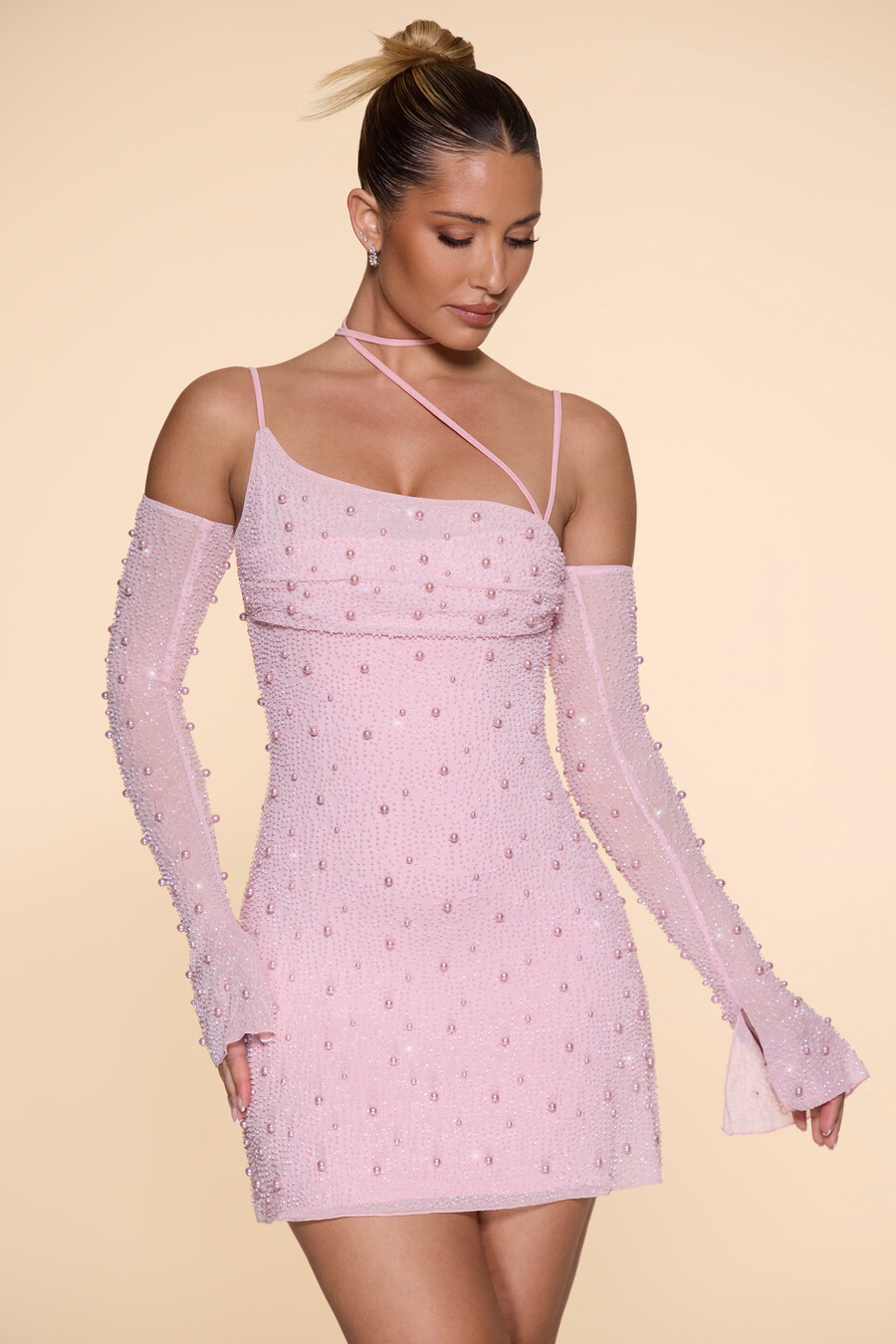 koristeltu epäsymmetrinen korsettiminimekko värissä blush