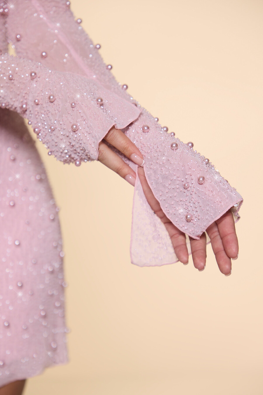 koristeltu epäsymmetrinen korsettiminimekko värissä blush