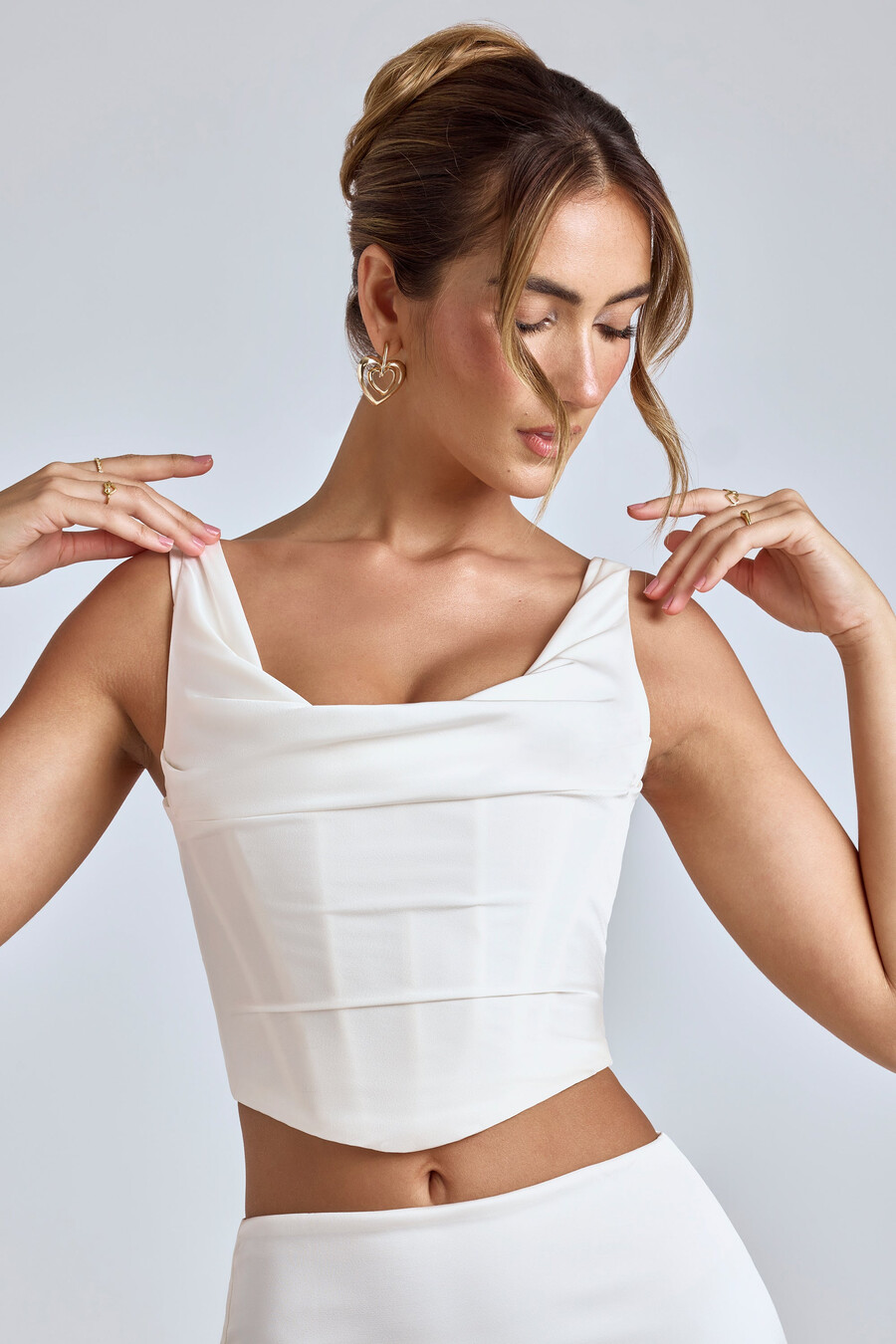 drapeerattu korsetti valkoinen