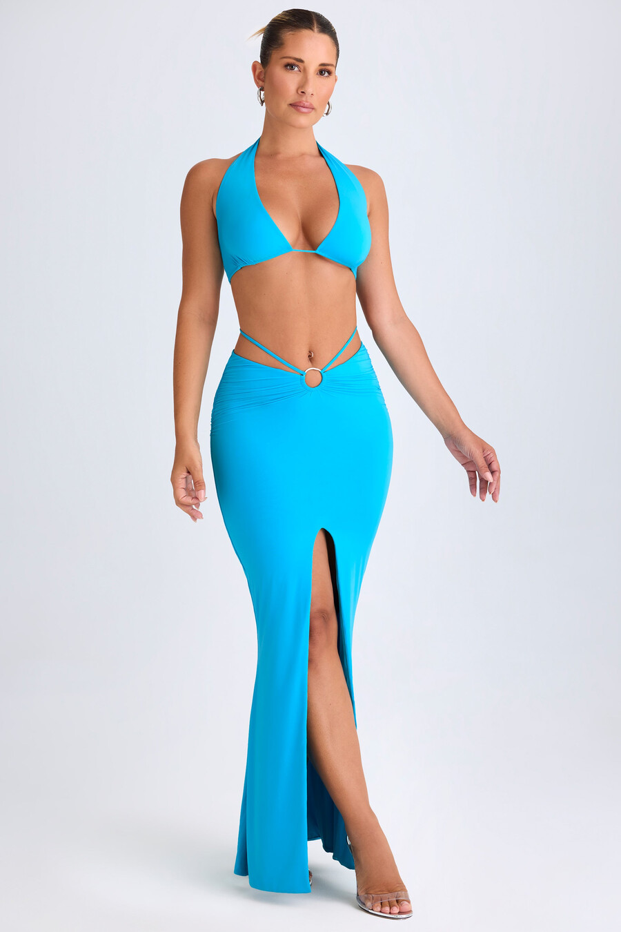 syväkauluksinen metalliosilla koristeltu halterneck-crop-toppi väri aqua blue